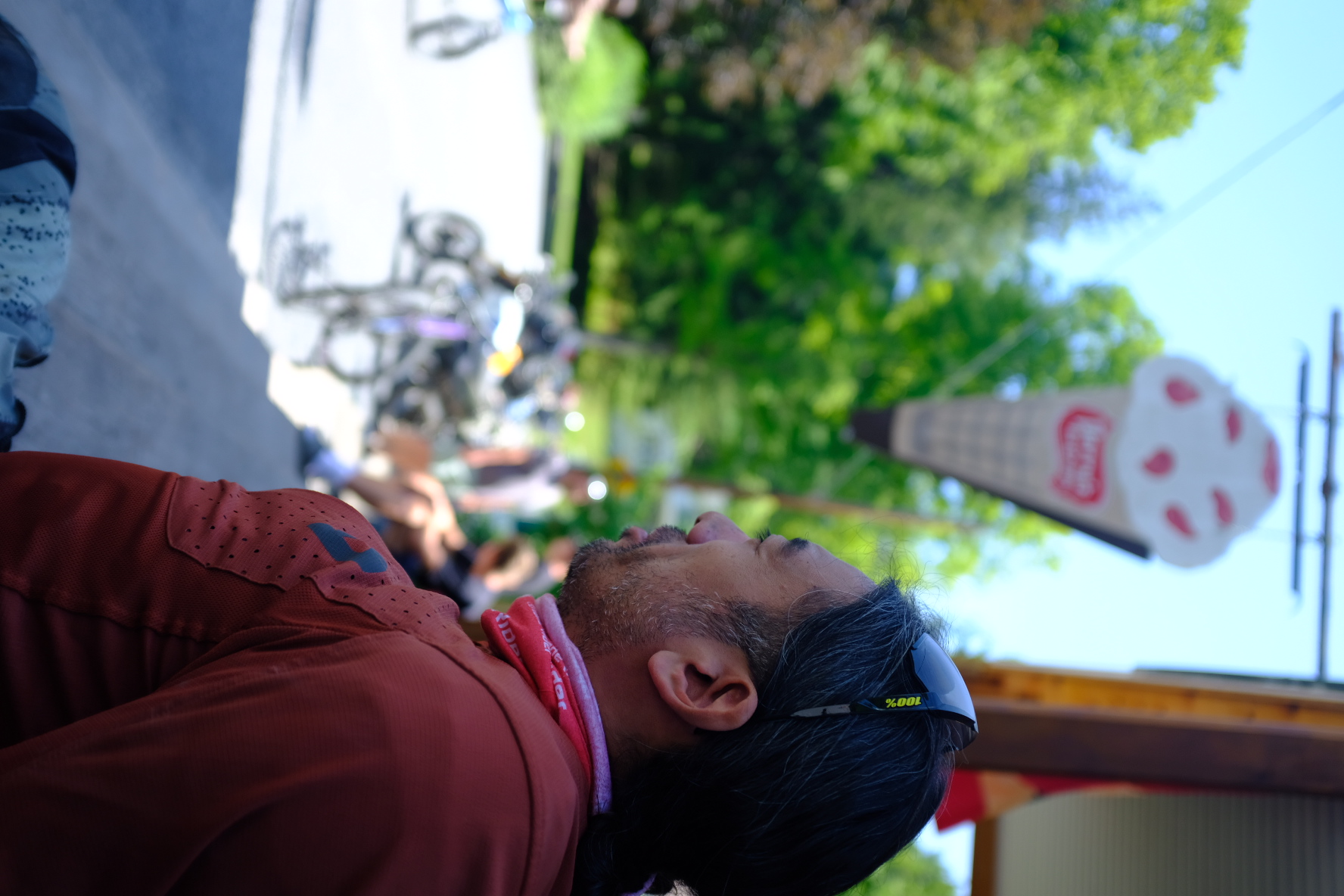 Rider resting in the shade during a lunch stop on the PA Wilds route