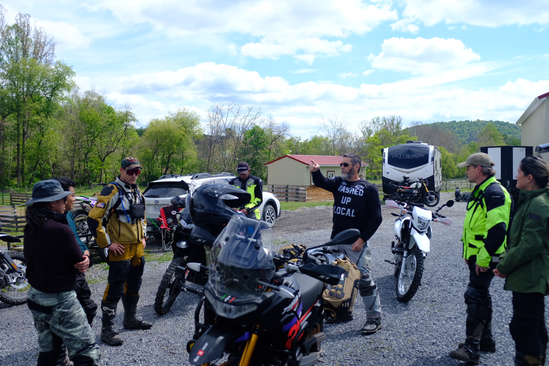 John leading the pre-ride safety meeting in the camp lot